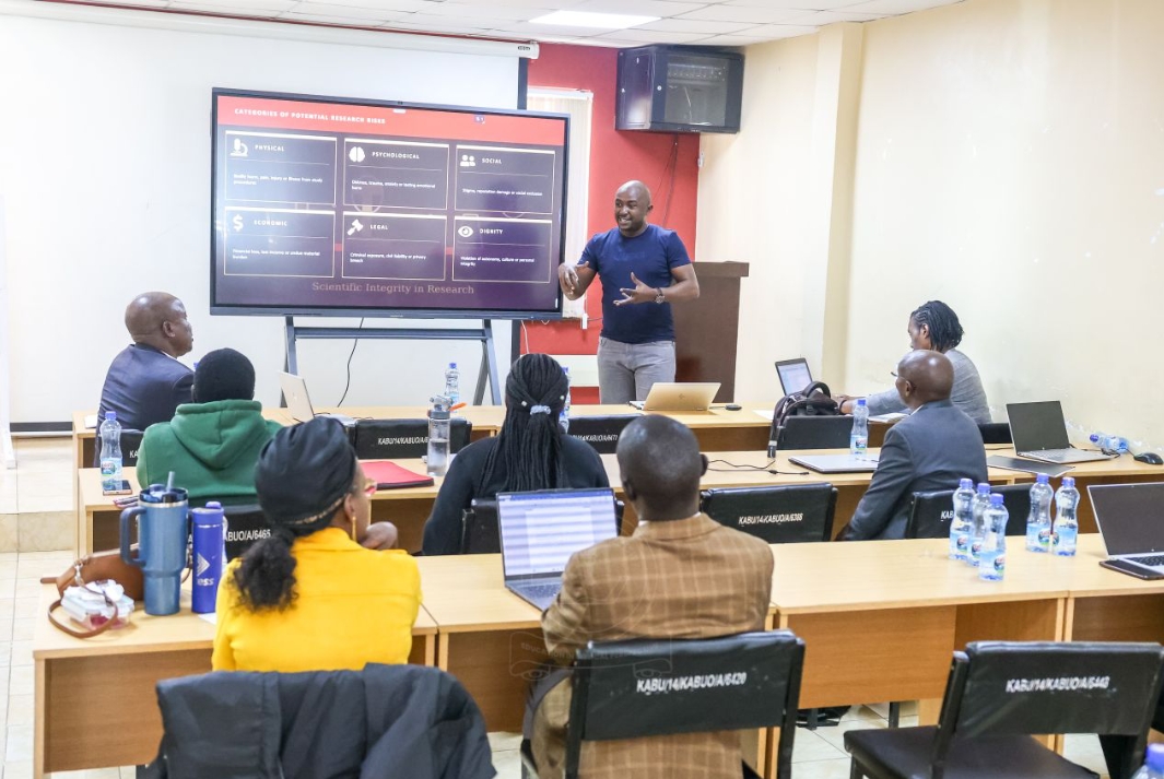 Dr. Walekhwa presents on potential risks, protection procedures, risk-benefit ratio, and conflict of interest in research at the Kabarak University Research Ethics Committee Members Workshop.